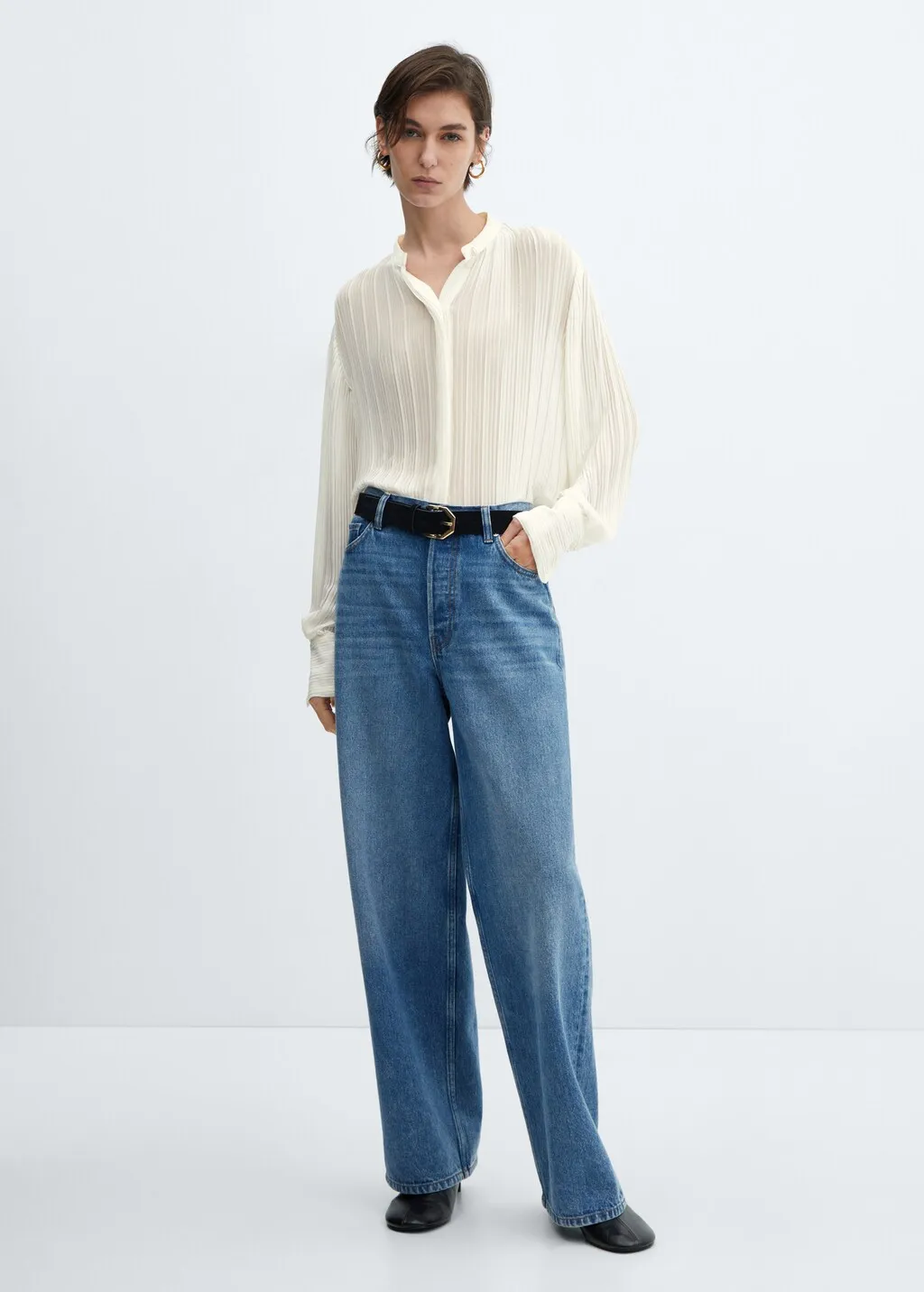 Blusa plissettata semitrasparente
