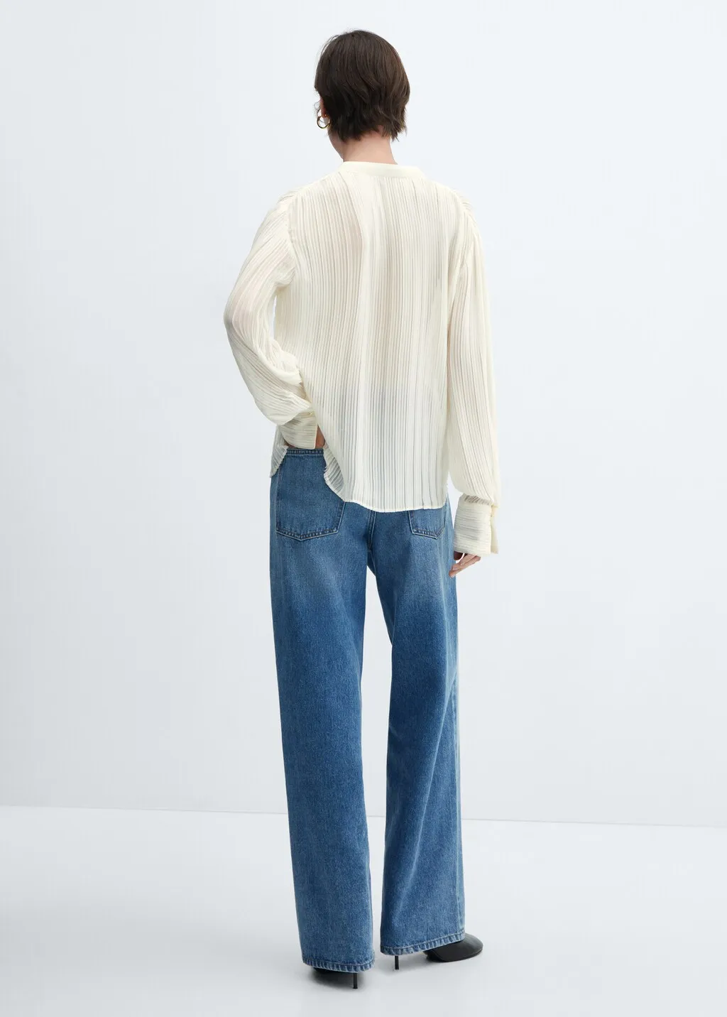 Blusa plissettata semitrasparente