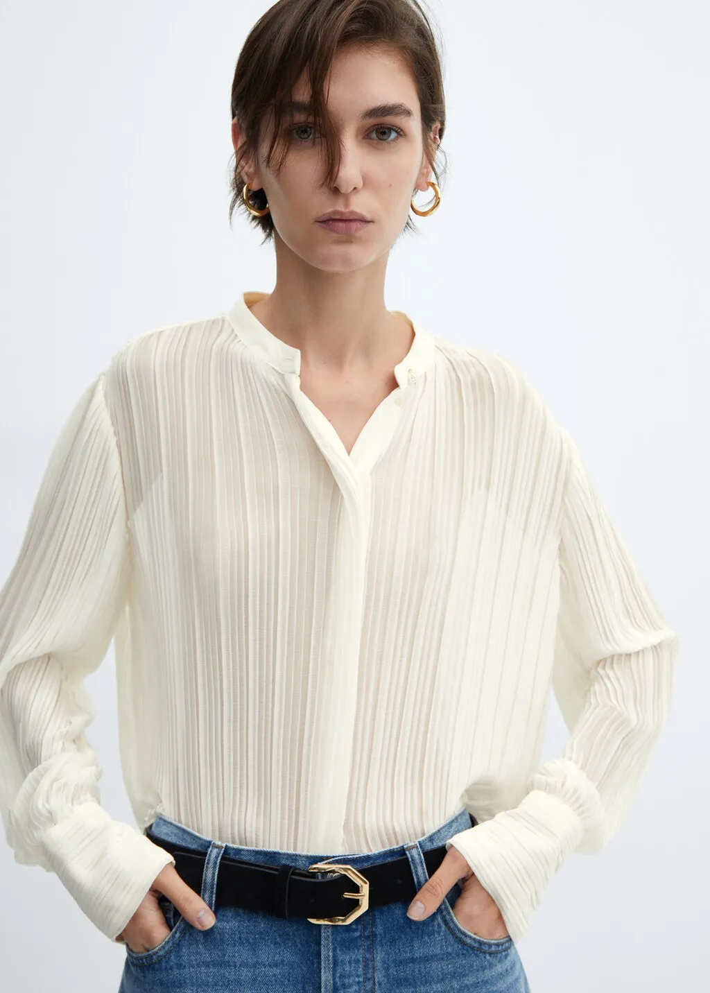 Blusa plissettata semitrasparente