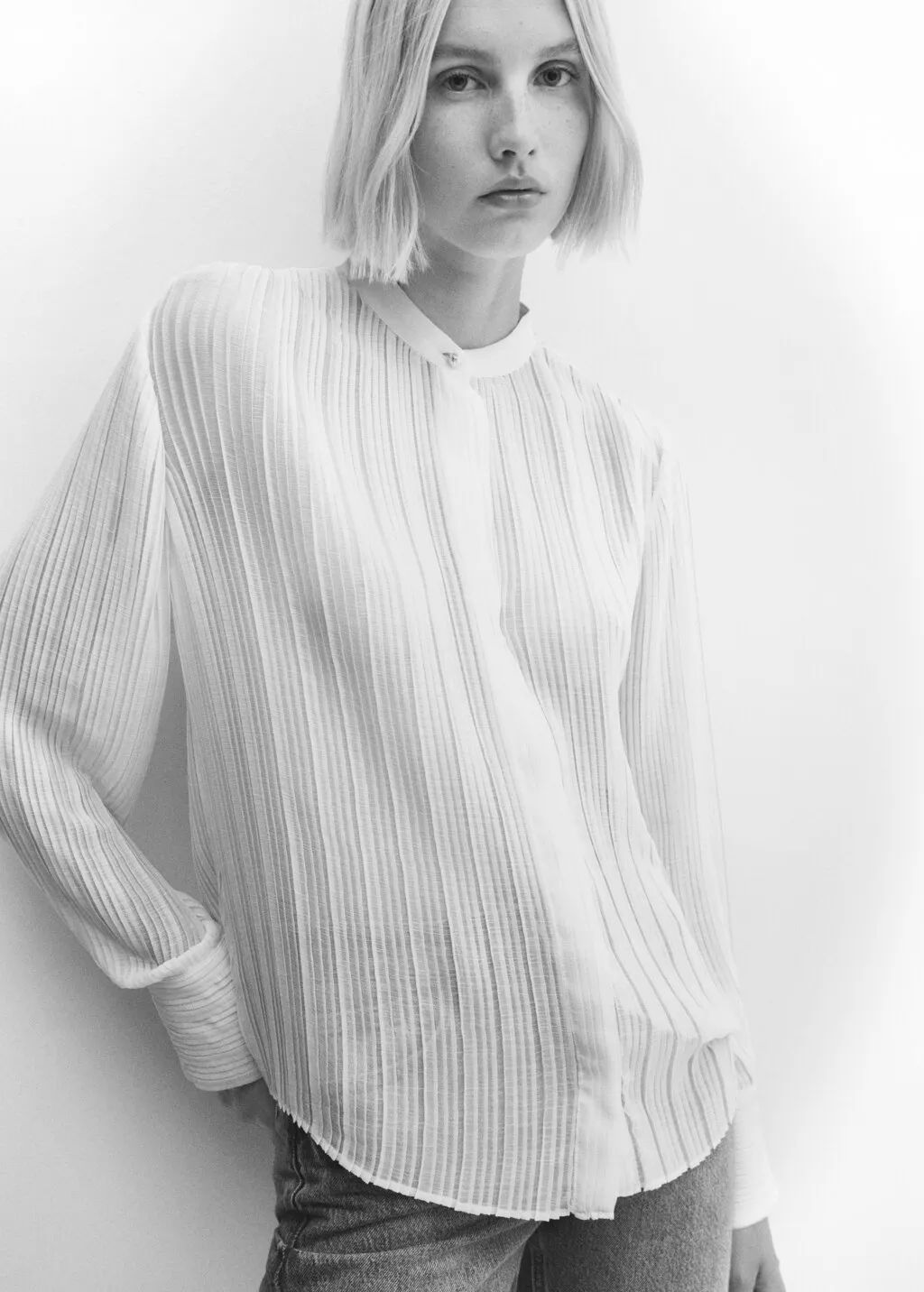 Blusa plissettata semitrasparente