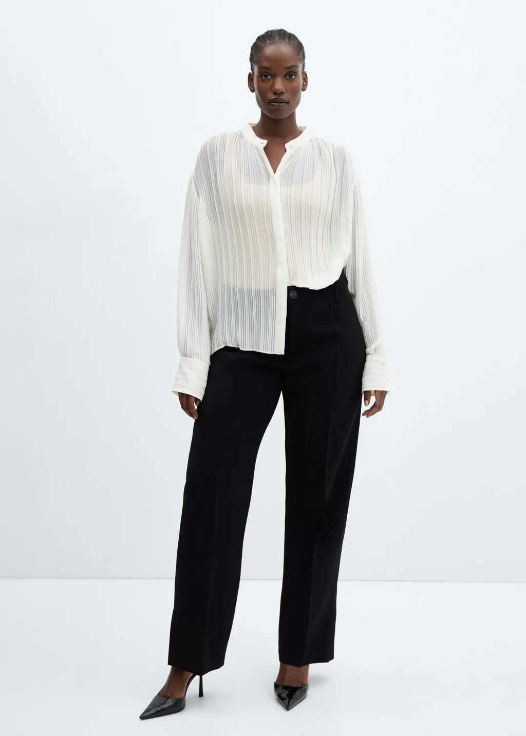 Blusa plissettata semitrasparente