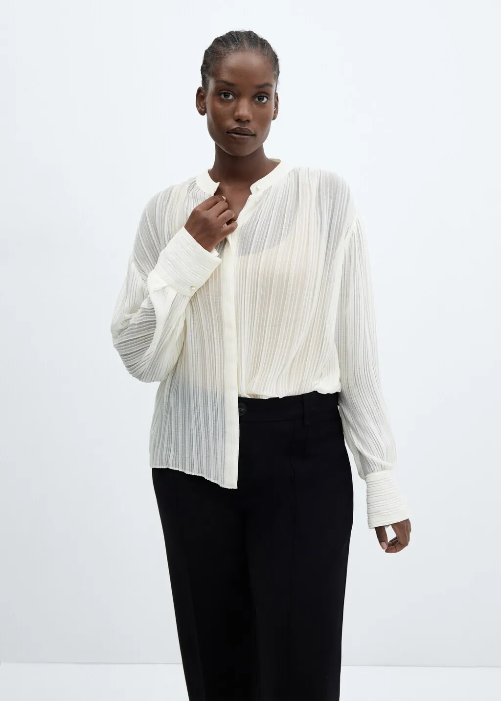 Blusa plissettata semitrasparente