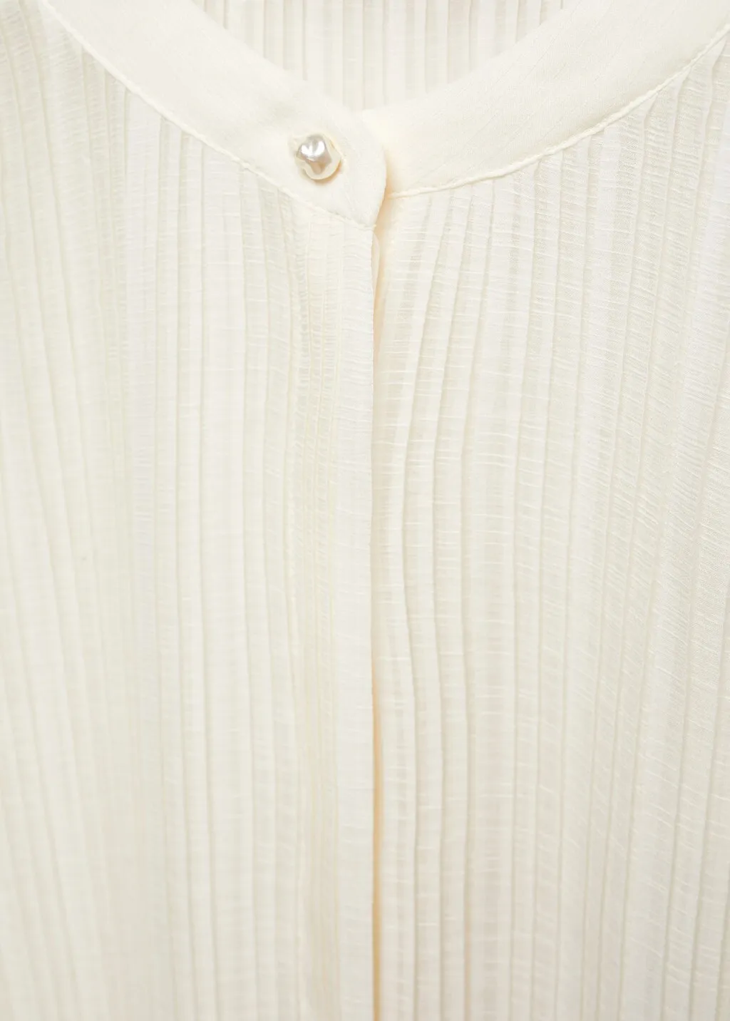 Blusa plissettata semitrasparente