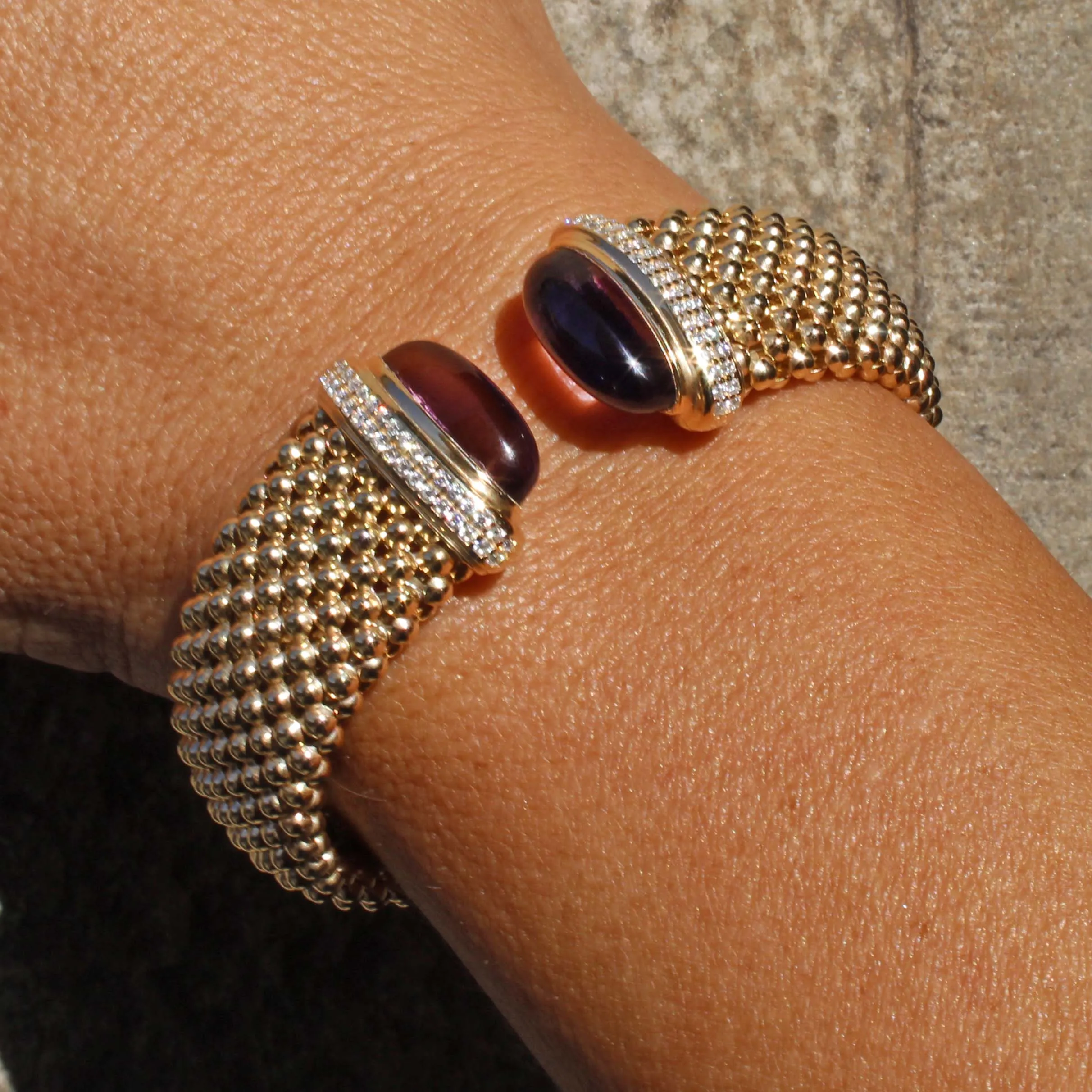 Bracciale rigido con ametiste idrotermaliezirconi