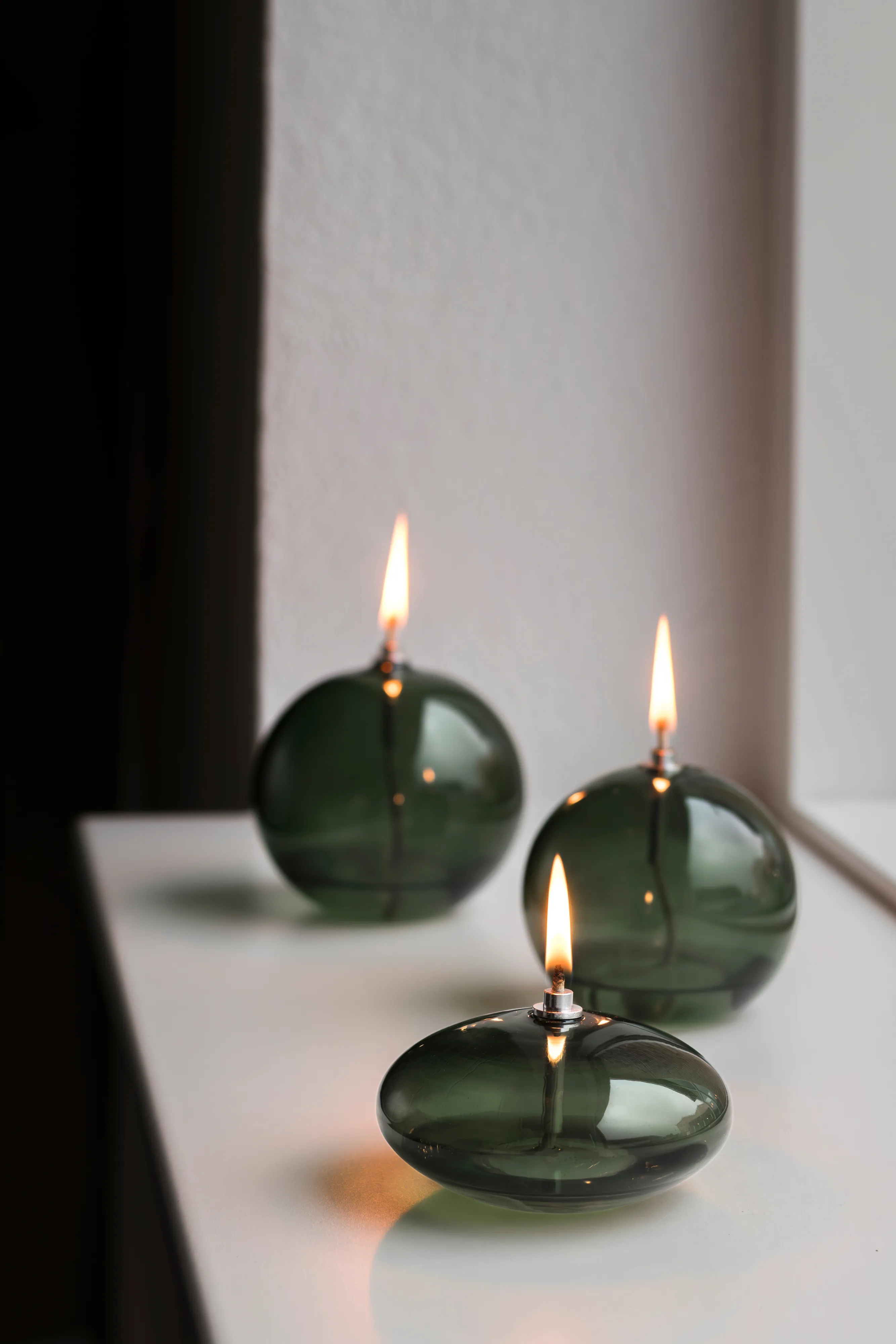 Lampada a olio Aura media.jn{font-size:18px}Grigio fumo