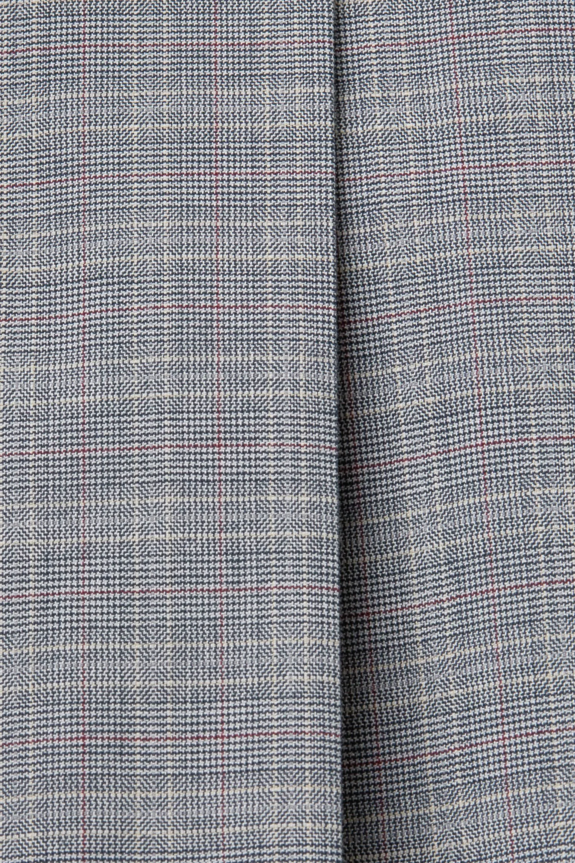 Mix & Match: minigonna plissettata e a quadri