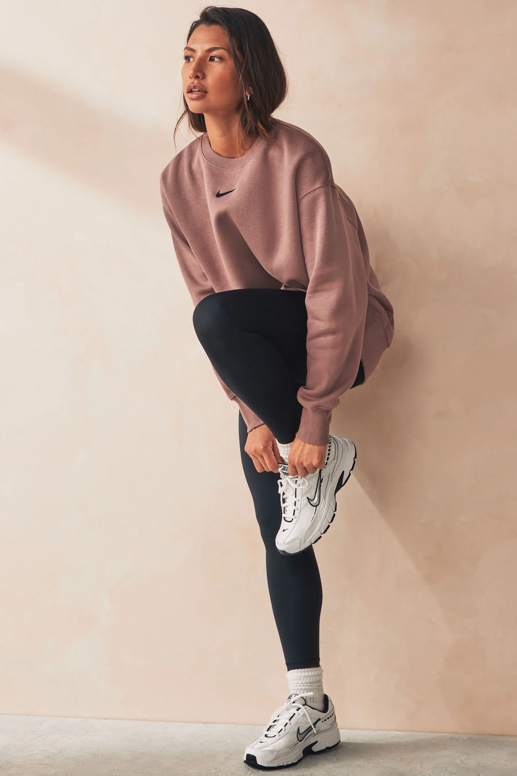 Nike - Felpa oversize con logo piccolo