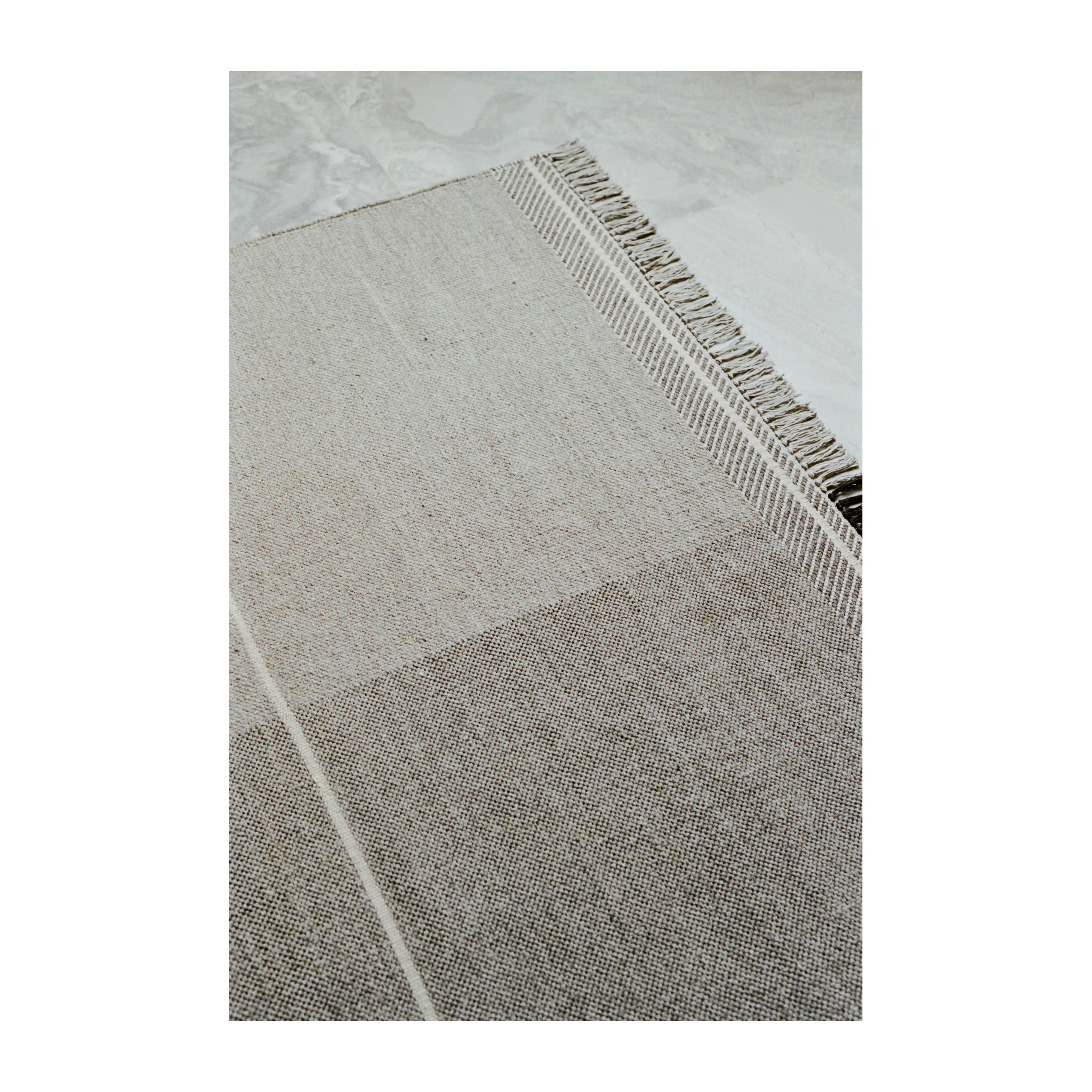 Tappeto in lana Mindful Soul 140x200 cm.jf{font-size:18px}Stone-beige